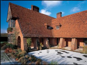 Image of A House With Brick Red Brick Roofing