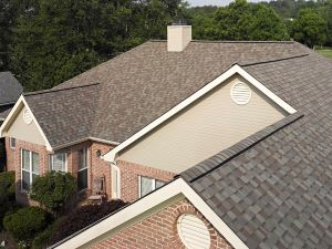 Image of A House Roof Asphalt Shade Using Brown Color Paint on the Roof, Asphalt Material